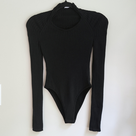 Alaia long sleeve wool blend ribbed knit bodysuit in black - Picture 2 of 12